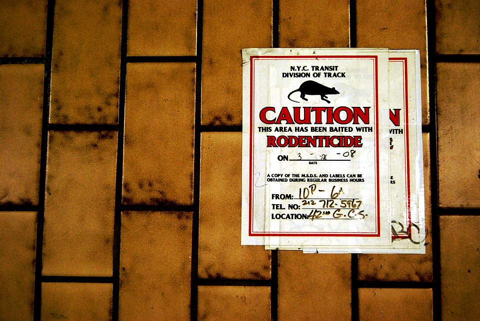 Warning sign from NYC Transit Division of Track stating the area has been baited with rodenticide.